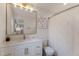 Clean bathroom with a white vanity and gold fixtures at 205 82Nd St # East, Holmes Beach, FL 34217
