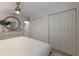 Spacious bedroom with ample closet space and light wood furniture at 205 82Nd St # East, Holmes Beach, FL 34217