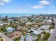 Aerial image showcasing a coastal neighborhood near the ocean at 215 75Th St, Holmes Beach, FL 34217