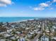 Aerial view of a coastal community with beach access at 215 75Th St, Holmes Beach, FL 34217