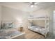 Bedroom with twin-over-twin bunk bed and coastal decor at 215 75Th St, Holmes Beach, FL 34217