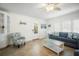 Additional living area with sofa and access to patio at 215 75Th St, Holmes Beach, FL 34217
