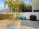 Outdoor patio with seating area, grill, and pool access at 2511 Prospect St, Sarasota, FL 34239