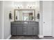 Modern bathroom with double vanity and granite countertop at 2511 Prospect St, Sarasota, FL 34239