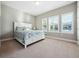 Charming bedroom with a white bed frame and window shutters at 2511 Prospect St, Sarasota, FL 34239