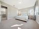 Spacious bedroom with carpeted floor and large windows at 2511 Prospect St, Sarasota, FL 34239