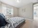 Serene bedroom with a gray platform bed and blue fish patterned bedding at 2511 Prospect St, Sarasota, FL 34239