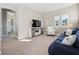 Spacious bonus room with comfy seating and large TV at 2511 Prospect St, Sarasota, FL 34239