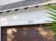 Brown double garage door with house number 2511 at 2511 Prospect St, Sarasota, FL 34239