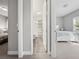 Hallway showing access to bedroom and bathroom at 2511 Prospect St, Sarasota, FL 34239