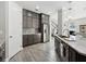 Modern kitchen with gray cabinets and stainless steel refrigerator at 2511 Prospect St, Sarasota, FL 34239