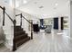 Open living room and staircase with wood flooring at 2511 Prospect St, Sarasota, FL 34239