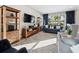 Spacious living room featuring a stylish sofa and rug at 2511 Prospect St, Sarasota, FL 34239