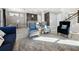 Open living room with kitchen view and seating area at 2511 Prospect St, Sarasota, FL 34239
