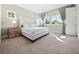 Spacious main bedroom with plush bed and ample natural light at 2511 Prospect St, Sarasota, FL 34239