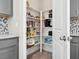 Well-organized pantry with ample shelving for storage at 2511 Prospect St, Sarasota, FL 34239