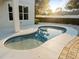 Relaxing kidney-shaped pool with a sun-kissed patio area at 2511 Prospect St, Sarasota, FL 34239