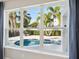 Relaxing pool area seen through large windows at 2511 Prospect St, Sarasota, FL 34239