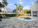 Inviting kidney-shaped pool with a spacious patio area at 2511 Prospect St, Sarasota, FL 34239