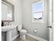 Clean powder room with pedestal sink and tile flooring at 2511 Prospect St, Sarasota, FL 34239
