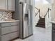 Stainless steel refrigerator in a gray kitchen at 2511 Prospect St, Sarasota, FL 34239
