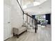 Elegant staircase with dark wood and white railings at 2511 Prospect St, Sarasota, FL 34239