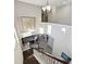 Elegant staircase overlooking the main living area and kitchen at 2511 Prospect St, Sarasota, FL 34239