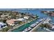 Waterfront home features a pool, boat dock, and easy water access at 279 Robin Dr, Sarasota, FL 34236