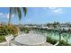 Outdoor dining area with water view at 279 Robin Dr, Sarasota, FL 34236