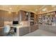 Spacious office with ample built-in shelving, cabinets, and desk space at 279 Robin Dr, Sarasota, FL 34236