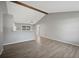 Open concept dining area with wood beam and gray walls at 3110 Elmer St, Sarasota, FL 34231