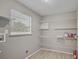 Laundry room with wire shelving and plenty of storage at 3110 Elmer St, Sarasota, FL 34231