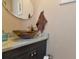 Stylish bathroom with granite countertop, vessel sink, and updated vanity at 3206 Ramblewood N Dr # 18D, Sarasota, FL 34237