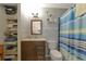 Clean bathroom with shower/tub combo and linen closet at 3206 Ramblewood N Dr # 18D, Sarasota, FL 34237