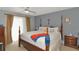 Spacious bedroom with a king-size bed and plenty of natural light at 3206 Ramblewood N Dr # 18D, Sarasota, FL 34237