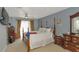 Spacious bedroom with a king-size bed and plenty of natural light at 3206 Ramblewood N Dr # 18D, Sarasota, FL 34237