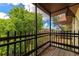Relaxing screened balcony overlooking lush greenery at 3206 Ramblewood N Dr # 18D, Sarasota, FL 34237