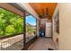 Screened porch with extra storage space at 3206 Ramblewood N Dr # 18D, Sarasota, FL 34237