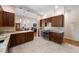Spacious kitchen with ample storage, granite countertops and tile flooring at 3310 Twin Rivers Trl, Parrish, FL 34219