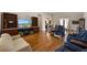 A nicely appointed living room shows beautiful hardwood floors and elegant furniture at 3310 Twin Rivers Trl, Parrish, FL 34219