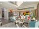 Sunlit living room features hardwood floors, modern decor, and an open-concept design at 3580 Fair Oaks Ln, Longboat Key, FL 34228