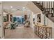 Spacious living room with high ceilings, large windows, stylish decor, and an inviting atmosphere for relaxation at 3580 Fair Oaks Ln, Longboat Key, FL 34228
