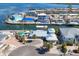 Aerial view of waterfront home with pool and landscaping at 3611 99Th W St, Bradenton, FL 34210