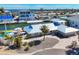 Aerial view of a waterfront home with a large pool at 3611 99Th W St, Bradenton, FL 34210