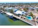 Aerial view of waterfront home with pool and boat lift at 3611 99Th W St, Bradenton, FL 34210