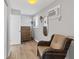Cozy bedroom with a wicker chair and ample closet space at 3611 99Th W St, Bradenton, FL 34210