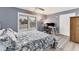 Bright bedroom with a queen-size bed and home office at 3611 99Th W St, Bradenton, FL 34210