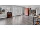 Bright entryway with double doors, hardwood floors, and built-in shelving at 3611 99Th W St, Bradenton, FL 34210