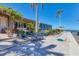 Landscaped patio with a bench and pergola near the water at 3611 99Th W St, Bradenton, FL 34210