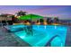 Stunning illuminated pool and spa at dusk at 3611 99Th W St, Bradenton, FL 34210